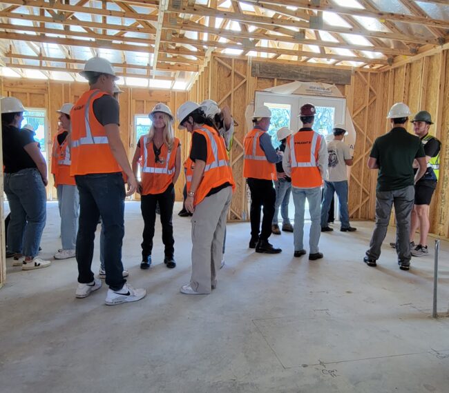 Kara Bolton hosting construction students on an active job site as part of workforce education efforts